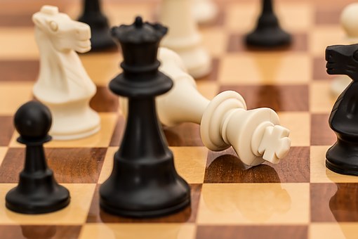 activities for elderly playing chess board game